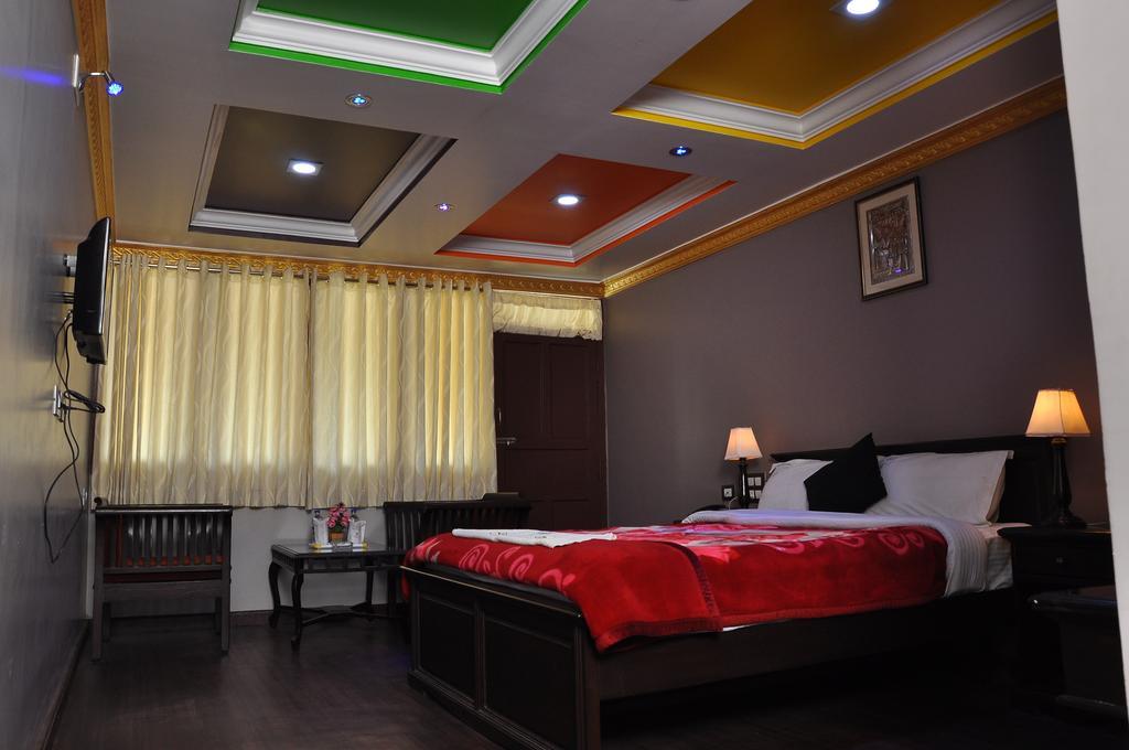كوديكانال Grand Paradise Inn الغرفة الصورة