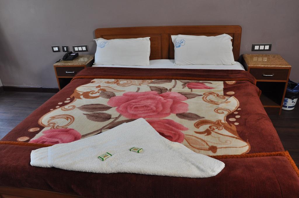 كوديكانال Grand Paradise Inn الغرفة الصورة